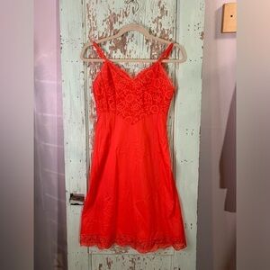 Vintage women’s Vanity Fair size 34 (small) red and lace midi length slip dress.